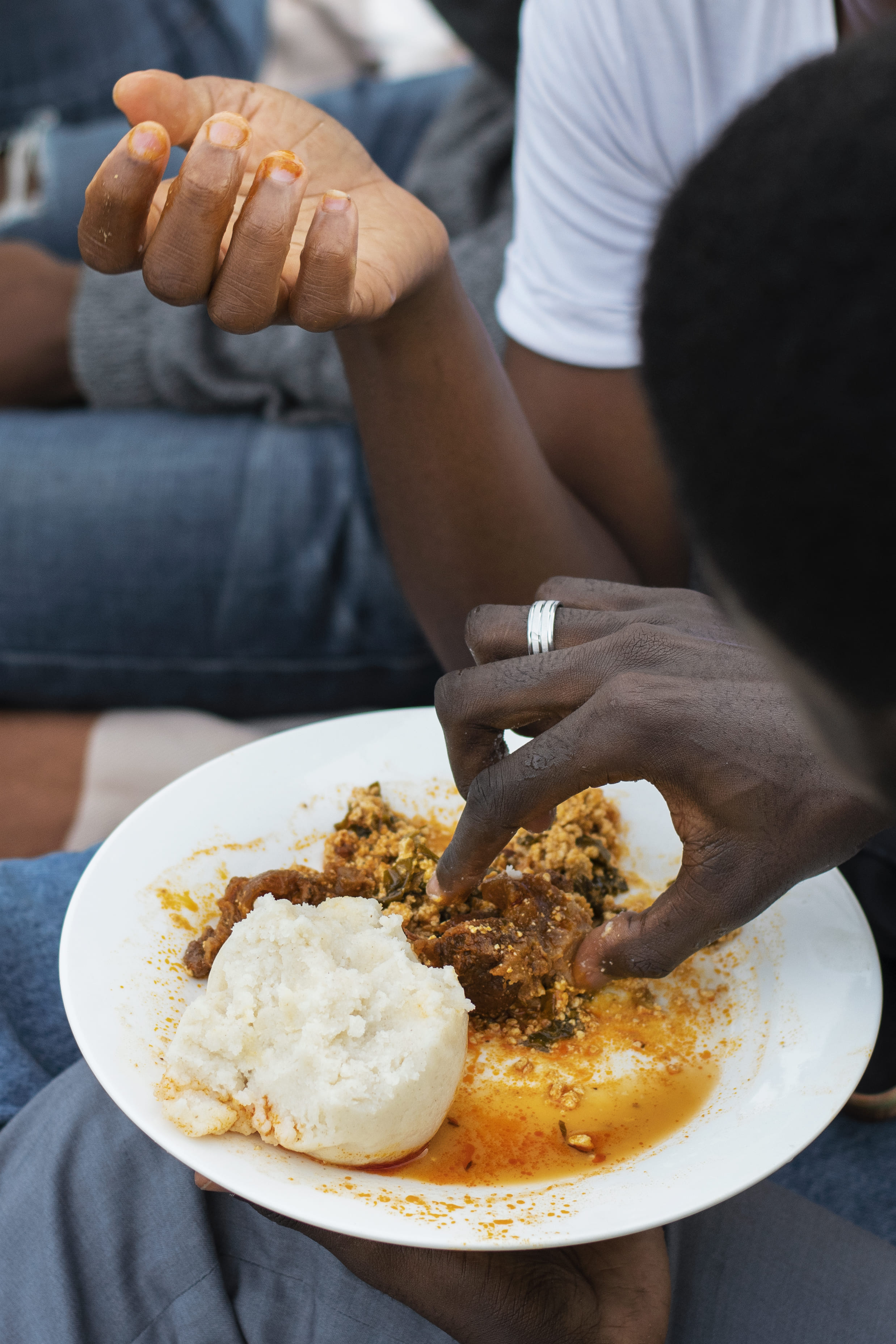 African chef cooking authentic food — Tamub food delivery and recipes app