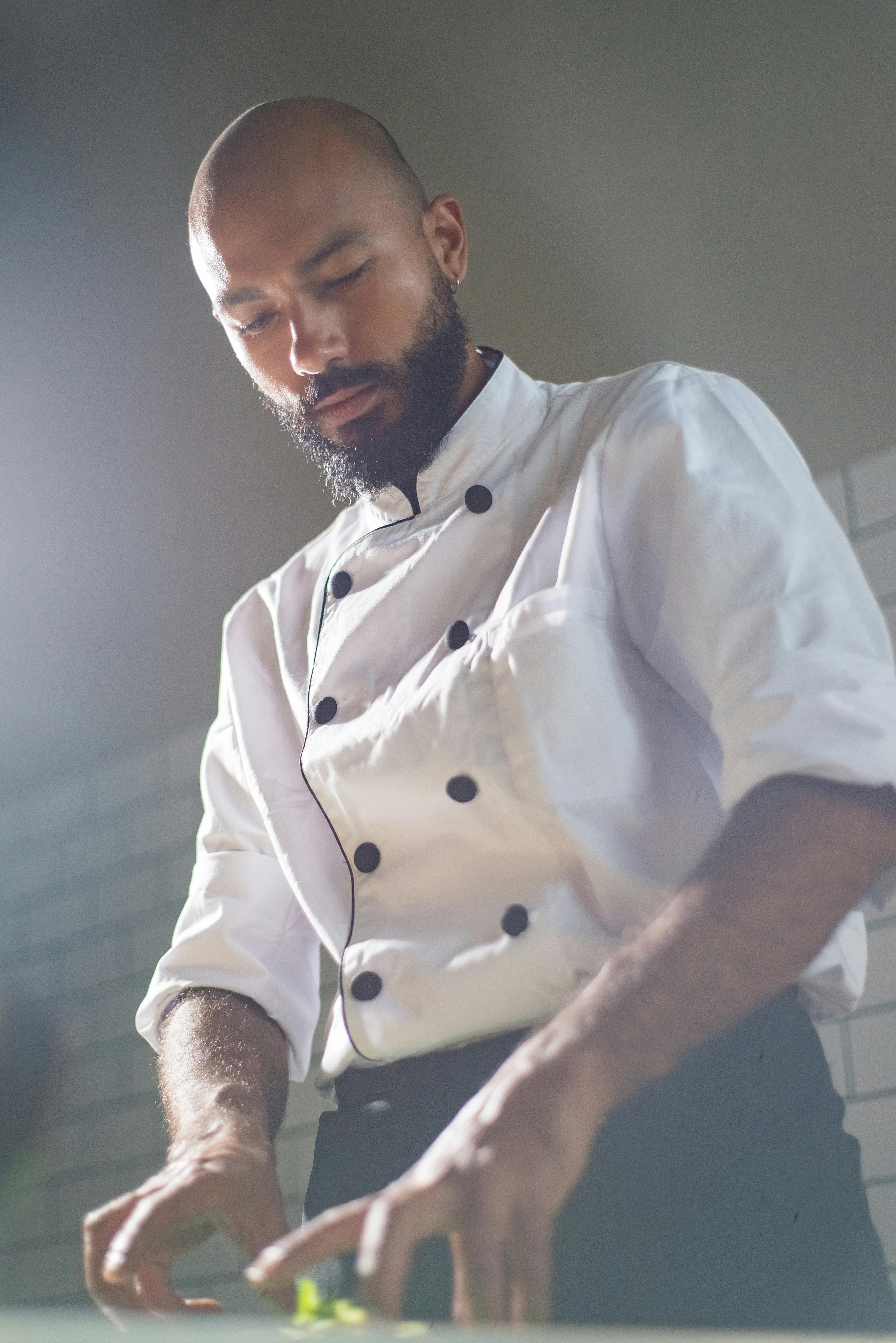 Restaurant owner managing orders on Tamub